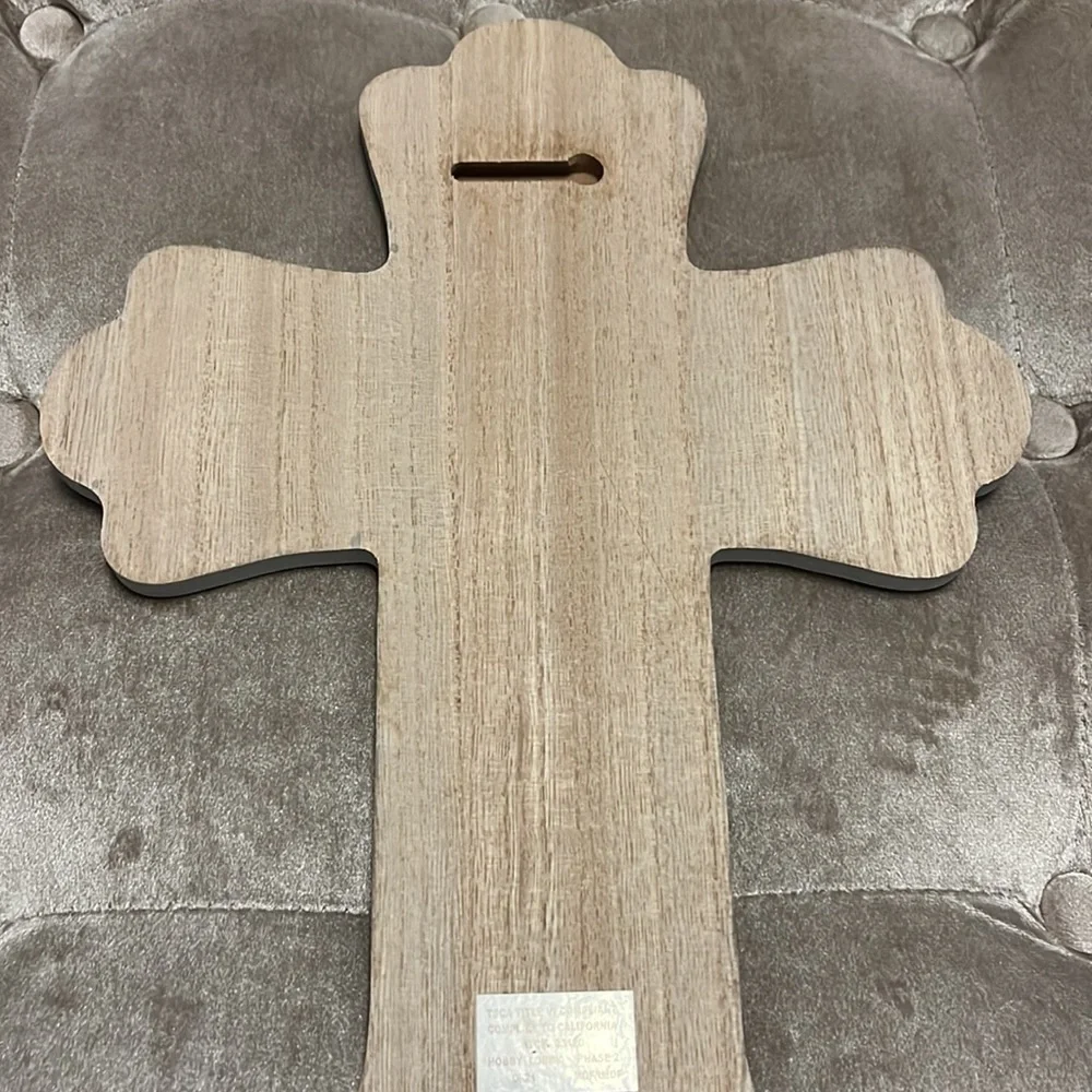 Gray wooden cross with white printing, rooted and established in love, Eph 3:17